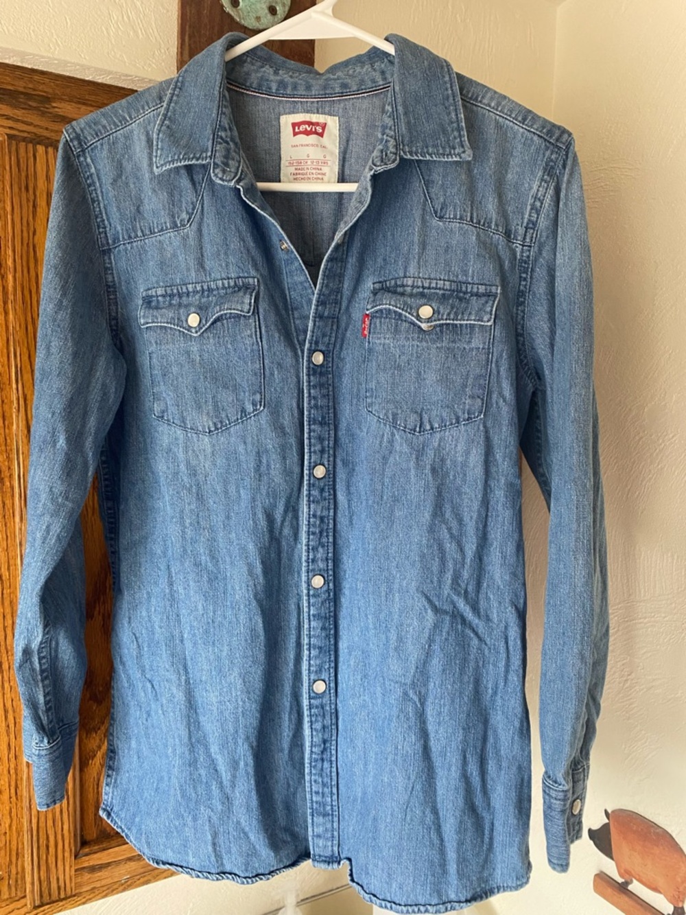 Levi’s pearl snap denim shirt. Youth Large
